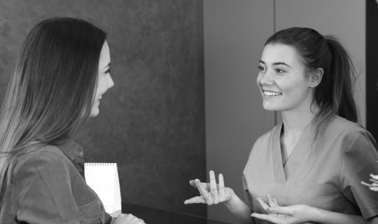 Customer relationship. Discussion front desk black and white