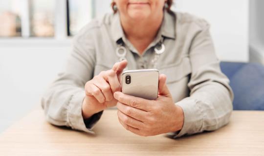 woman using her phone